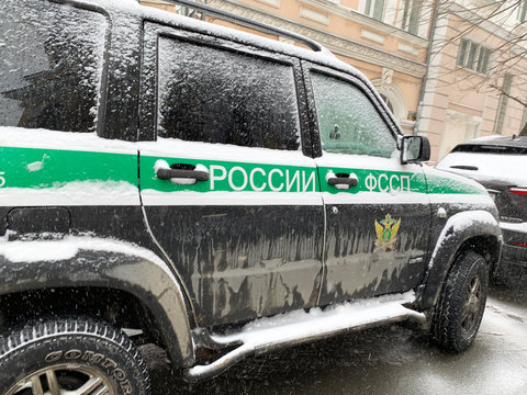 Vladivostok, Russia, March, 12,2020. Car of the Federal bailiff service in a snowfall. Russia