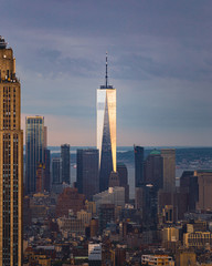 Sunset view of the new World Trade Center from rooftop in NYC, USA