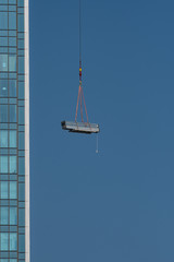 Construction material hoisted to the higher level