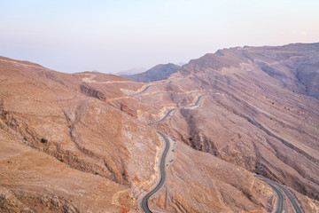 Aerial view of mountain roads from the highest point in UAE at Jebel Jais in Ras Al Khaimah
