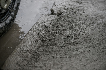 Road pits in the city in the spring after the snow melts. Problem of roads and asphalt in the city.