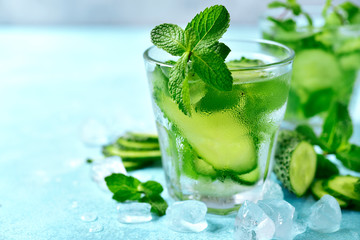 Summer refreshing drink with cucumber and mint. Top view with copy space.