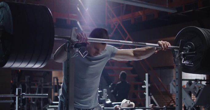 Young man working out in gym
