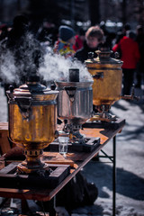 three samovars in the winter on the street, Russian traditions