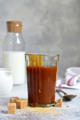 Homemade milk salted caramel in a glass.