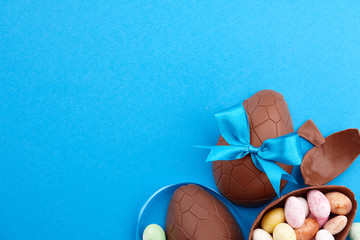 Chocolate Easter eggs with colorful candies