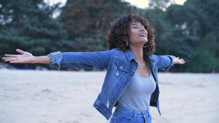 Holiday concept. Negro girl enjoying rest on the beach. 4k Resolution.