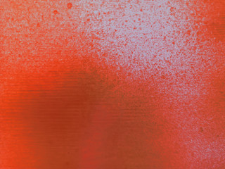spray orange on Corrugated paper Abstract color wallpaper Graphic arts paper background, gradient dot texture