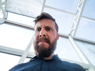 closeup. portrait of an emotional bearded man