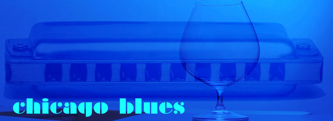 text "chicago blues", diatonic blues harmonica and a glass on a blue background, banner concept , mouth  harp on  background - playing blues on a harper harmonica