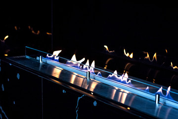 fire in a biofireplace.  Modern bio fireplot fireplace on ethanol gas.