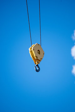 A picture of a crane hook against the sky.   Vancouver BC Canada