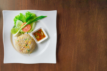 Fried rice on white plate, Thai street food.