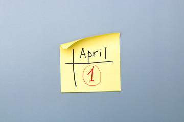 april fools day reminder on yellow sticky note. be aware and do not let be fooled