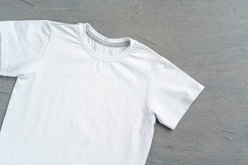 Close up of a white color t-shirt, copy space