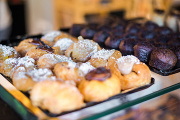 Pastry display with pastry desserts in a bakery