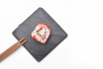 Japanese roll on stone background.