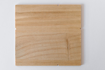 A small wooden board on the table.