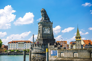 Fototapeta na wymiar Lion's statue in the harbor of Lindau, Bavaria, Germany.