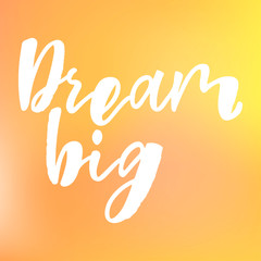 Obraz premium Dream big - handwritten quote. Design print for sticker, badge, greeting card, diary, notebook, banner, poster, clothes. Vector illustration on blurry background. 