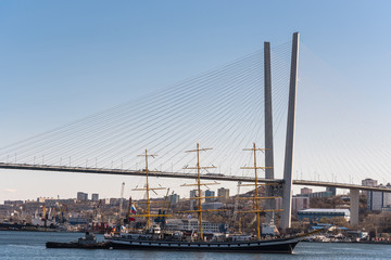 the port of Vladivostok and the Pallada sailing ship on the roadstead
