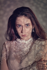 Portrait of a girl with highlights on her face