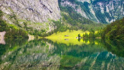 lake Obersee in the mountains with beautiful reflection