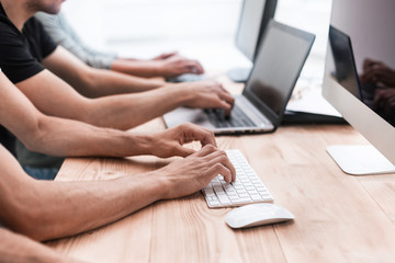 Fototapeta premium close up. guy student working on computer.
