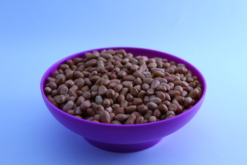 Ground Nut On A Bowl In White Background