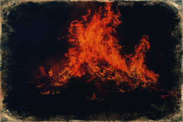 beautiful big fire on black night background, old photo effect.