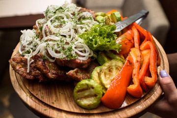 Delicious freshly cooked skewers with vegetables. Tasty and healthy food. Close-up photo.