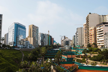 View of the coastal promenade of Lima in the dsitrict of Miraflores with a view of the ocean and steep cliffs (Lima, Peru, South America)