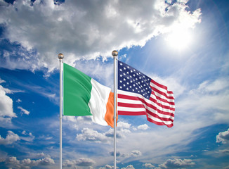 United States of America vs Ireland. Thick colored silky flags of America and Ireland. 3D illustration on sky background. - Illustration