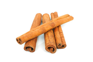 Cinnamon sticks isolated on white background closeup
