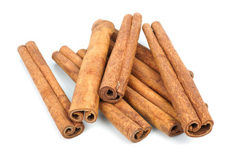 Cinnamon sticks isolated on white background closeup