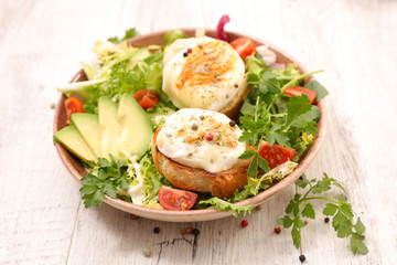 vegetable salad with goat cheese toast and avocado