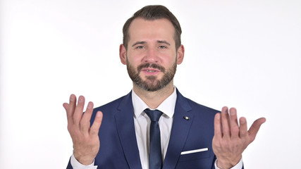 Portrait of Cheerful Young Businessman doing Video Chat, White Background