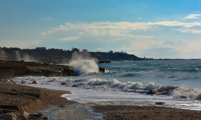 waves crashing on rocks