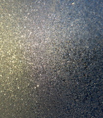 Frosty pattern on the window glass.