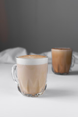 Cafe latte and Cortado in glass cups