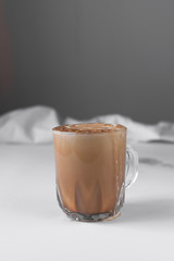 Cortado coffee in a glass coffee cup