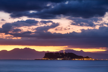 Enoshima Island evening light up across the water