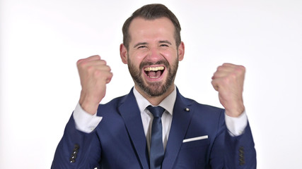 Portrait of Ambitious Young Businessman Celebrating Success, White Background