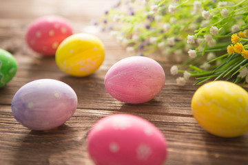 Easter eggs on a old wooden surface