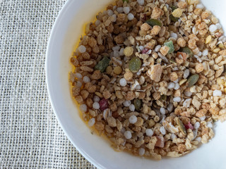 Healthy cereals, muesli on the table in a plate.