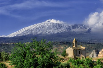Fototapeta na wymiar Etna Volcano Above Rural Chapel, Sicily