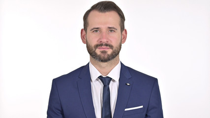Portrait of Young Businessman Looking at the Camera, White Background