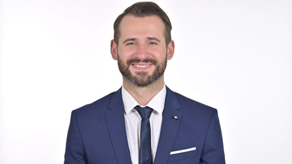 Portrait of Smiling Young Businessman Looking at the Camera, White Background