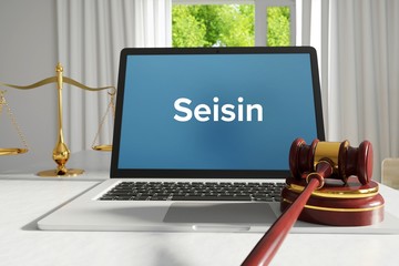 Seisin – Law, Judgment, Web. Laptop in the office with term on the screen. Hammer, Libra, Lawyer.