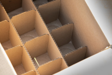 cardboard partition for beverage or spray bottles. packaging concept. - obrazy, fototapety, plakaty